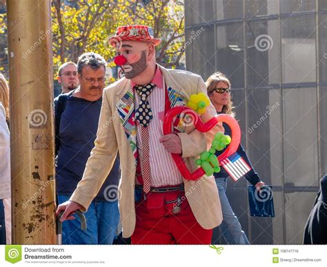 A Unidentified Man Dressed Clown Amuse People Near Cable Car Editorial