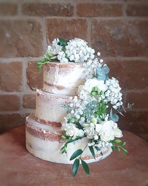 Semi Naked Wedding Cake With White Flowers Naked Wedding Cakes Wedding Cakes Wedding Cake