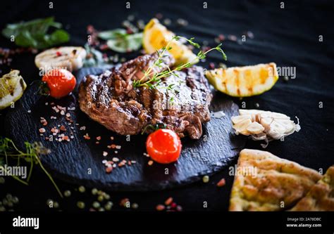 Delicious Rib Eye Steak With Grilled Vegetables Fresh Spices Stock