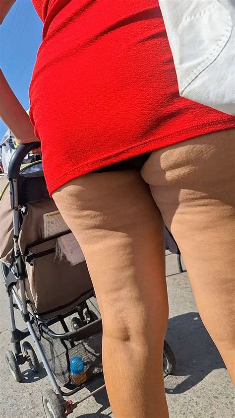 Shameless Milf Latina In A Very Short Red Dress Showing Off Her Cheeks I Appreciate It Oc