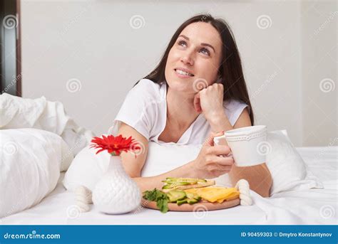 Dreamy Smiling Brunette Enjoying Her Unforgettable Breakfast Stock Image Image Of Gourmet