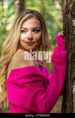 A Lovely Blonde Model Poses Outdoor While Enjoying The Fall Weather Stock Photo Alamy