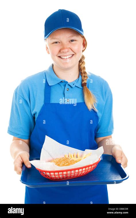 Teenage fast food worker serving a hamburger and french fries. Isolated on white Stock Photo - Alamy