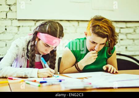 Women In An Art Class Drawing A Nude Female Model Stock Photo Alamy
