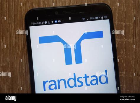 Randstad NV logo displayed on a modern smartphone Stock Photo - Alamy