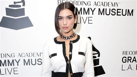 Dua Lipa Wears a White Chanel Set to a Grammy Museum Performance | Vogue