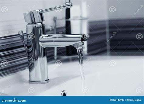 Stream Of Water Flowing From Tap In Bathroom Stock Image Image Of