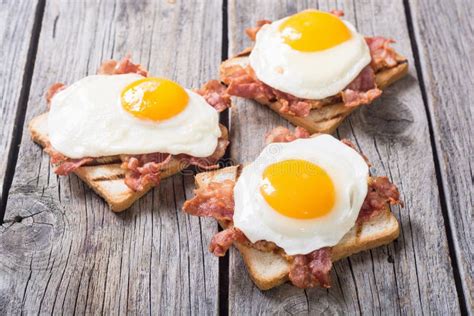 Toast with Bacon and Fried Eggs Stock Image - Image of crispy, eggs ...