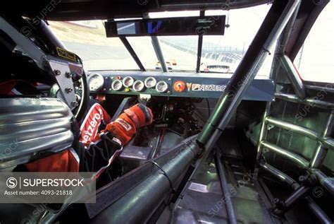 interior detail NASCAR driver gear shift hand glove race car - SuperStock