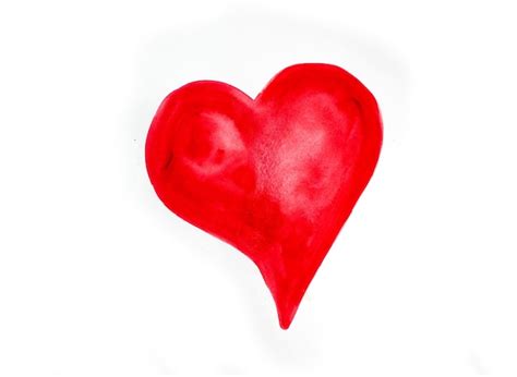 Premium Photo Close Up Of Red Heart Shape Over White Background