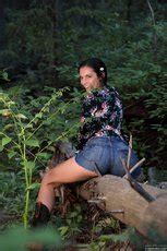 Elena Generi Shows Her Hairy Pussy In The Forest Photos