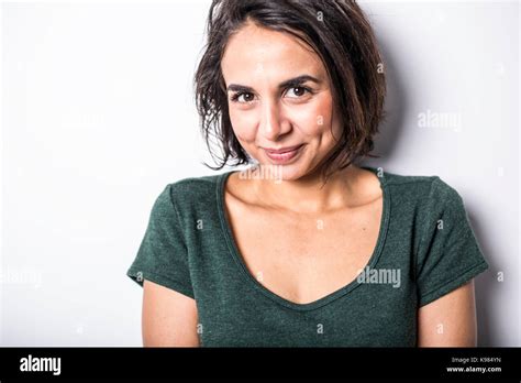 A Bright Brunette Girl Isolated On A White Background Stock Photo Alamy