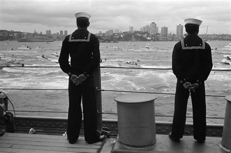 Crew Members Man The Rail Of The Battleship Uss Missouri Bb As