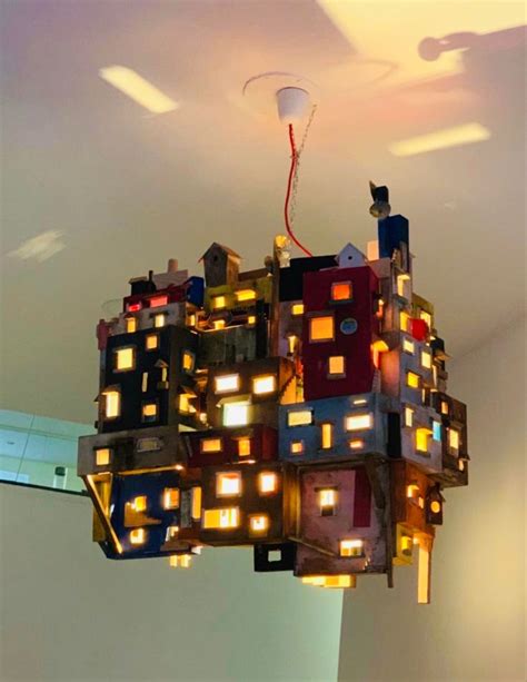 A Chandelier Made Out Of Legos Is Hanging From The Ceiling