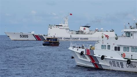 Philippine Boats Breach Chinese Coast Guard Blockade Near Disputed Shoal