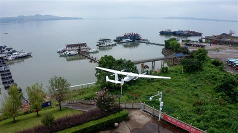 A VTOL (Vertical Takeoff and Landing) fixed-wing drone is utilized for ...