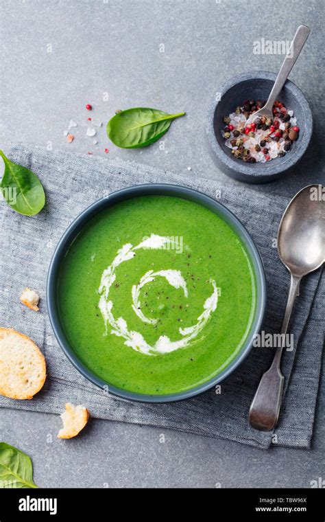 Broccoli Spinach Cream Soup In A Bowl With Toasted Bread Top View Plant Based Diet Stock