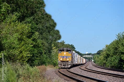 With Its Train Visible Strung Out Behind Them Two Locomotives Lead A