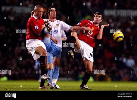 L R Manchester United S Mikael Silvestre And Roy Keane Combine To Stop