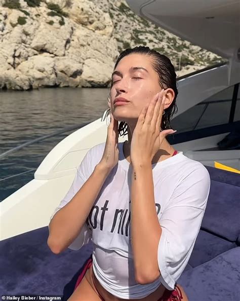 Hailey Bieber Turns Up The Heat As She Takes To The Beach In A String Bikini And Wet T Shirt