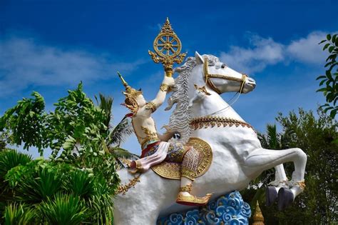 Premium Photo Statue Of Deity God Or Goddess Riding A Horse At The