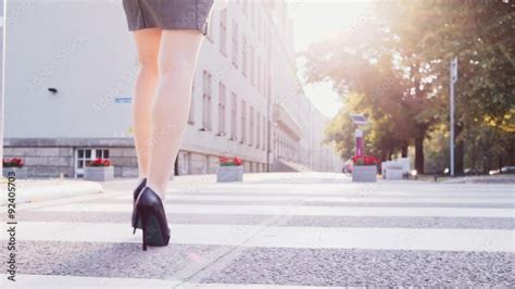 Sexy Woman Legs In Black High Heels Shoes Walking In The City Urban