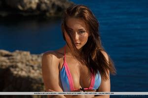 Tanned Juicy Brunette Spreads Her Long Legs XXX Dessert Picture