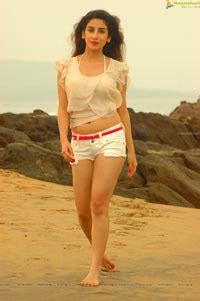 Beautiful And Hot Parul Gulati At Beach High Resolution Posters Gallery Images