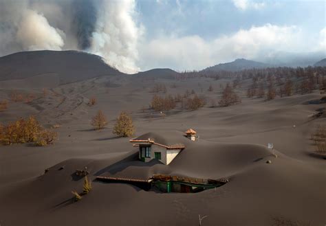 Photos Show Buildings Buried In Ash As Canary Island Volcano Continues To Erupt