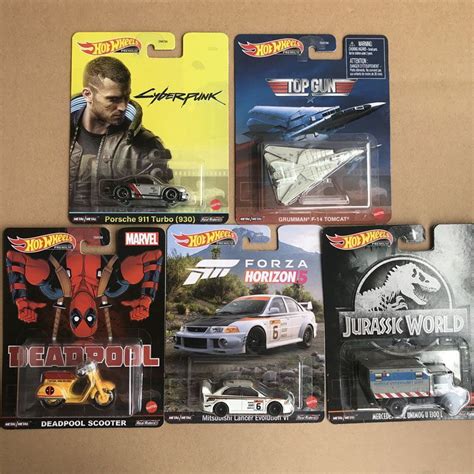 Hot Wheels Cultura De Entretenimento Rodas Quentes DMC55 Nissan Aston Martin De Volta Ao