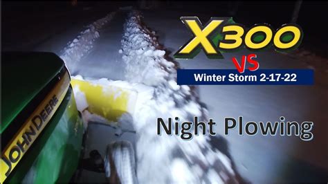 John Deere X300 Plowing Snow At Night After Winter Storm Youtube