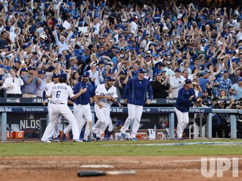 Photo Dodger Players And Fans Celebrate 6 5 Win Over Nationals In Game