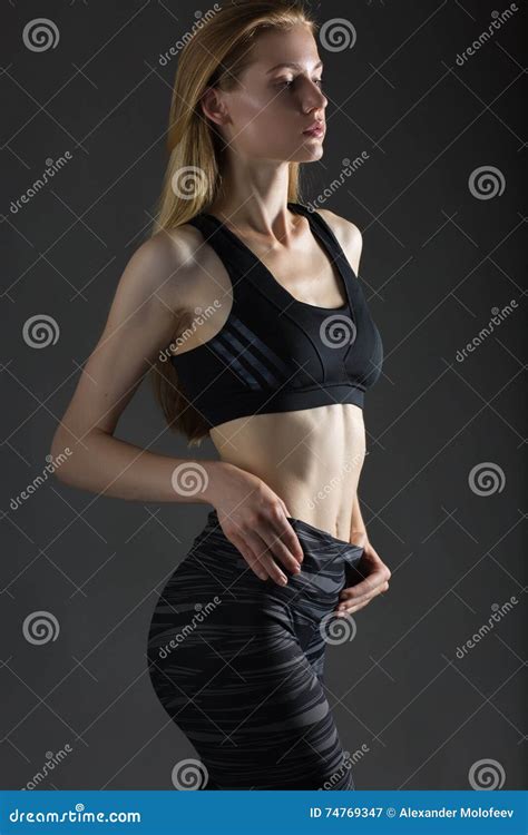 Beautiful Blonde Woman Perfect Athletic Slim Figure Engaged In Yoga Exercise Or Fitness Lead
