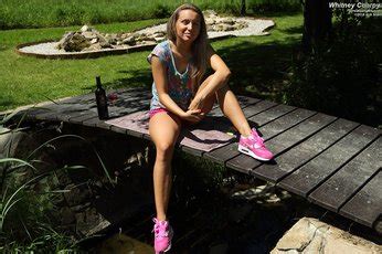 Whitney Conroy Stuffs A Bottle In Her Shaved Pussy Photos