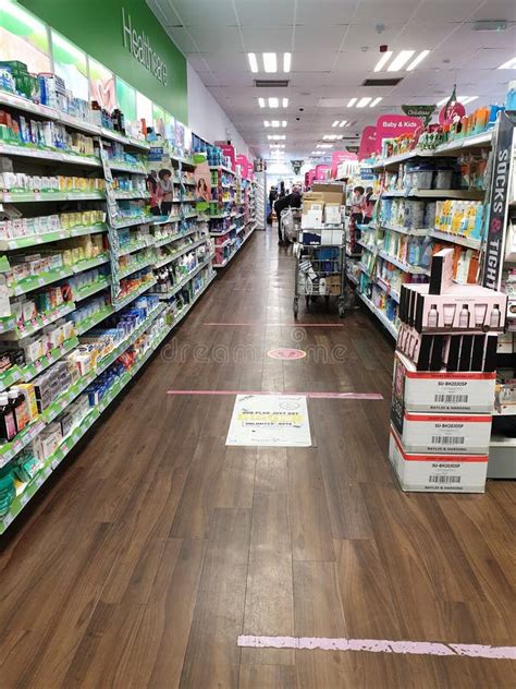 Interior Of Superdrug Store With Display Of Over The Counter Medicine