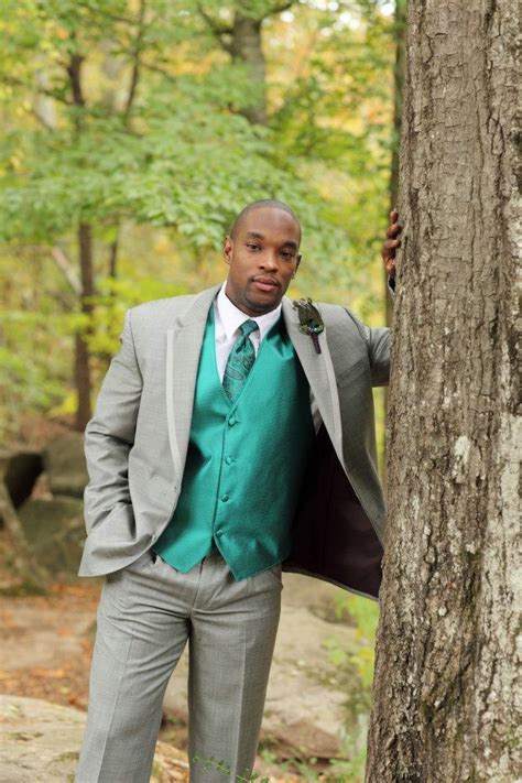 Groom With Teal Vest And Peacock Feather Bout Peacock Groom And