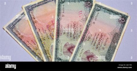 A Collection Of A Blurred Egyptian One Pound Banknote And