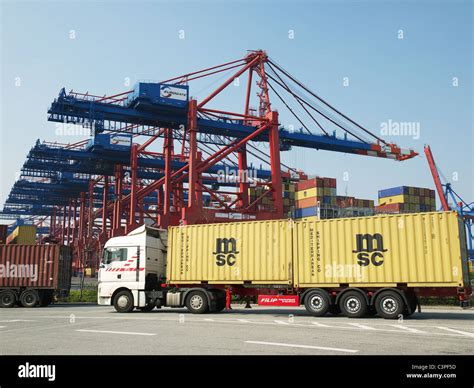 Truck With Two Msc 20 Containers Approaching The Container Terminal