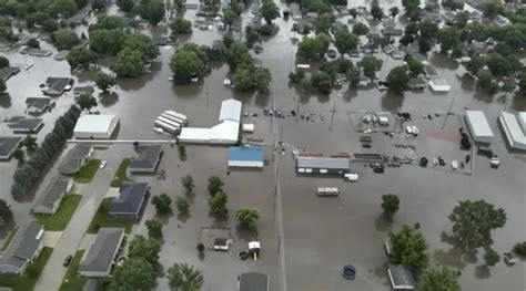 Helicopters Scramble To Rescue People In Flooded Iowa Town While Much