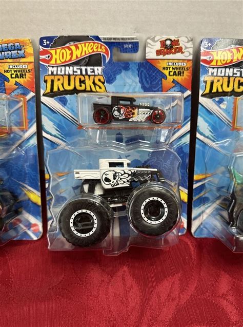 Hot Wheels Monster Trucks Bone Shaker And Mega Wrex With Hot Wheels Car 164 Scale Ebay