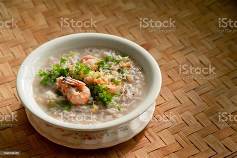 Boiled Rice Clear Soup With Shrimp And Green Leafy Vegetables In A