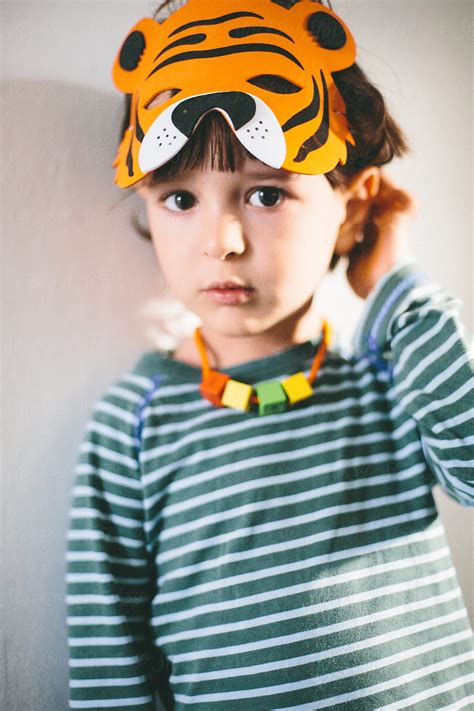 "Portrait Of A Child With Tiger Mask" by Stocksy Contributor "Michela ...