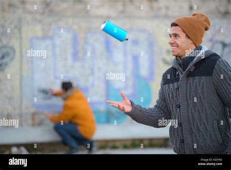 cool young-man with spray Stock Photo - Alamy