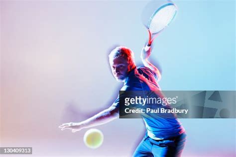 Tennis Player Swinging Racket High Res Stock Photo Getty Images