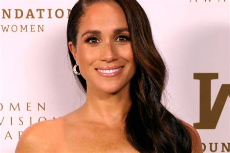 Meghan Markle Stuns In A Luxurious Gold Dress At The Women Of Vision Awards