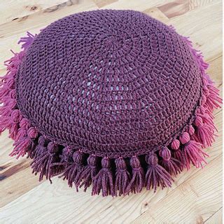 Ravelry: Fringed Circular Pillow pattern by Caron Design Team