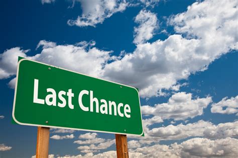 Last Chance Green Road Sign Over Clouds and Sky. 