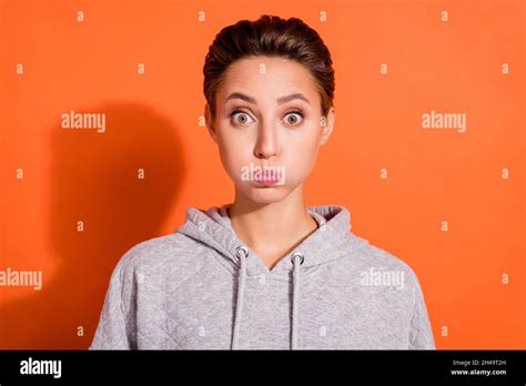 Photo Of Shiny Funny Young Lady Wear Grey Sweatshirt Bloated Cheeks Big