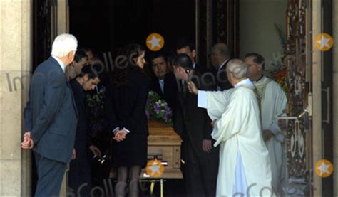 Photos and Pictures - The Priest Is Blessing the Casket Memorial ...