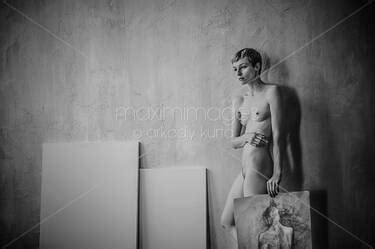 Photo Of Black And White Art Nude Portrait Of Woman Artist Standing Naked With A Painting